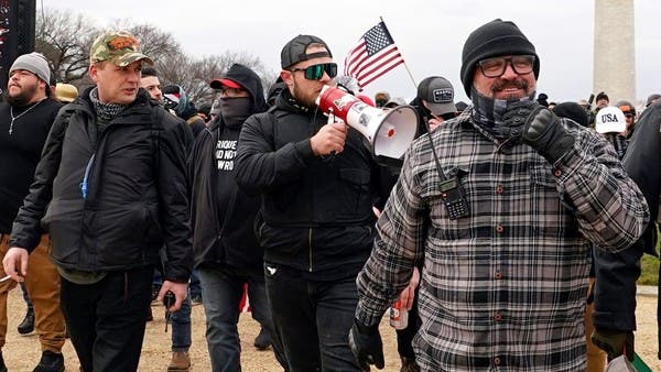 Two leaders of Proud Boys group that stormed the US capitol sentenced to prison