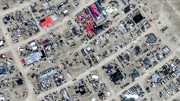 Flooding traps thousands at Burning Man festival in Nevada desert, one death reported