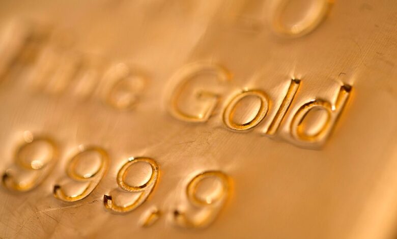 Gold prices touch record high after Powell’s comments