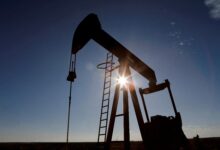 Oil holds near 3-week low as US sanctions interrupt easing tensions