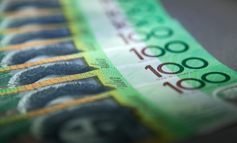 Aussie, NZ dollars on defensive, markets run away from rate cuts