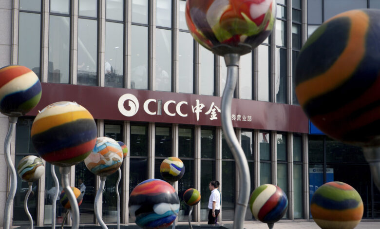 China’s CICC demotes senior bankers, cuts pay to slash costs