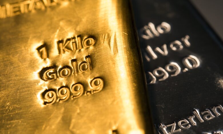 Gold dips as US dollar edges higher, investors seek more Fed cues