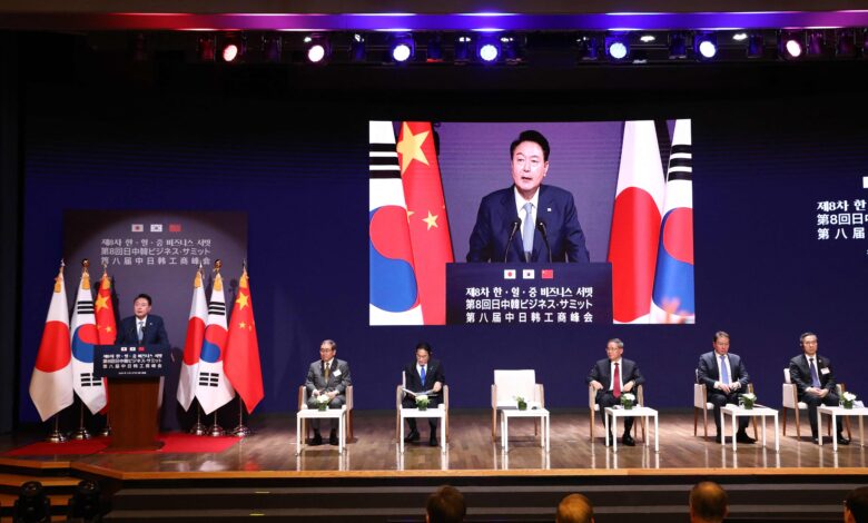 South Korea, China, Japan vow to ramp up cooperation in rare summit