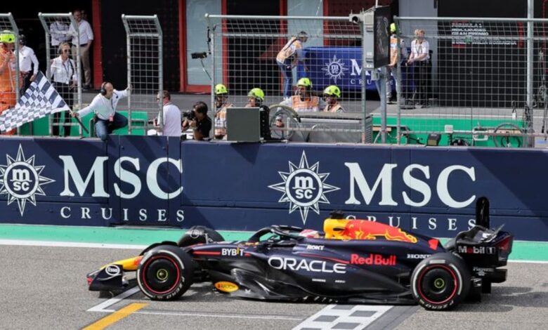 Verstappen holds off charging Norris to win at Imola