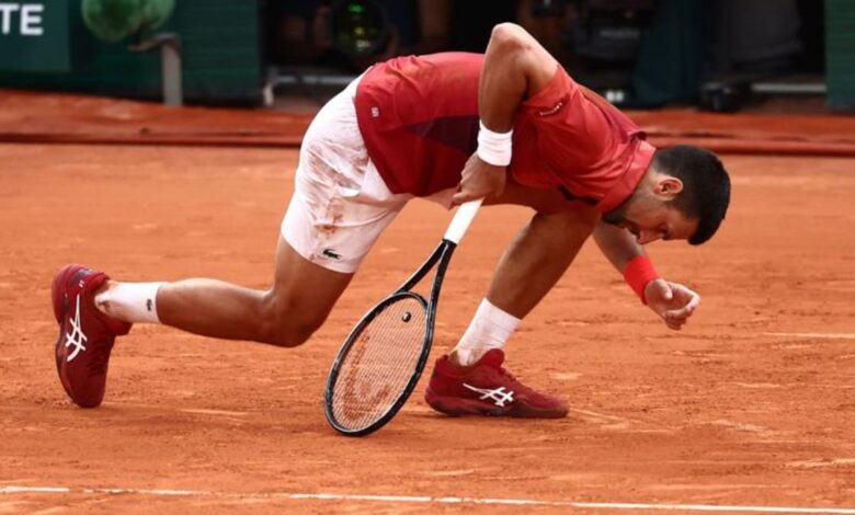 Djokovic shrugs off injury, pips Cerundolo in another French Open epic