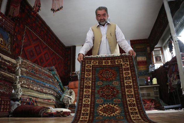 Afghan carpet seller upbeat about business opportunities ahead from China-South Asia Expo