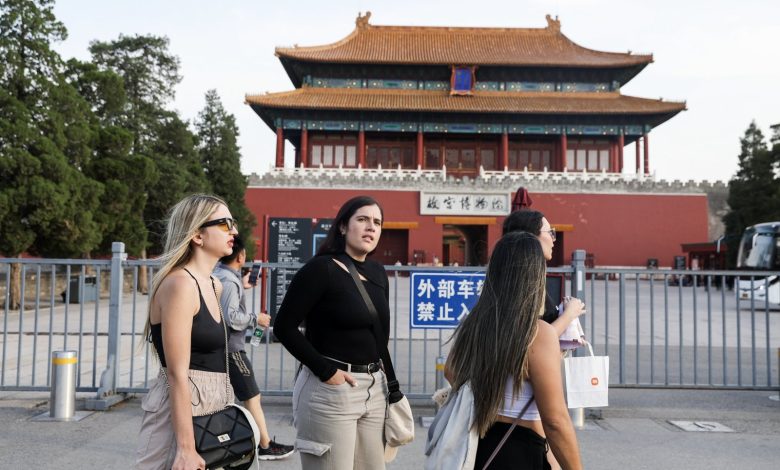 China lures tourists with easy entry, but tough sell for some