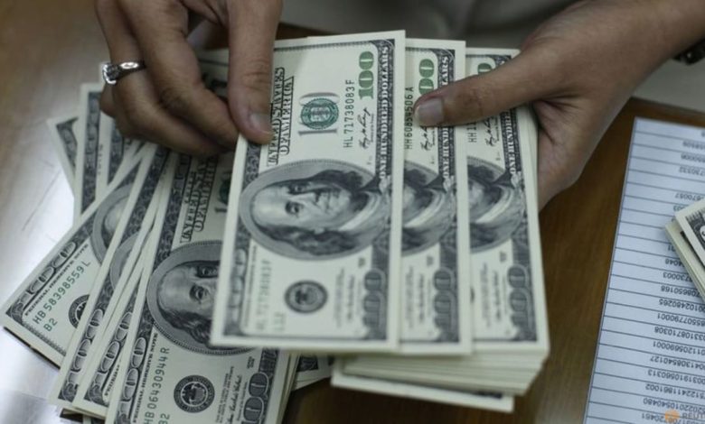 Dollar treads water after tame US inflation report, yen rally stalls