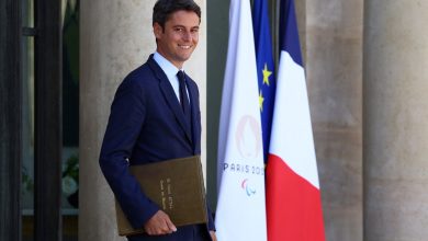 French PM resigns but to stay as head of caretaker government