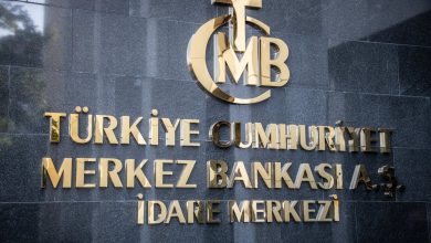 Turkish central bank holds rates, sees disinflation strengthening