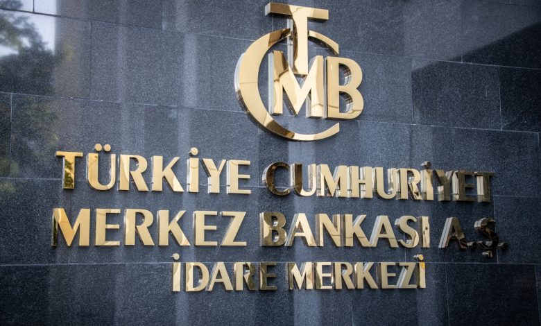 Turkish central bank holds rates, sees disinflation strengthening