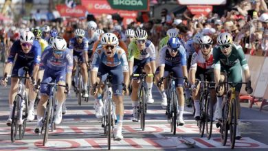 Bitter edges Van Aert to win Vuelta fifth stage