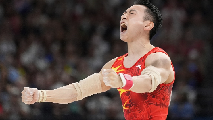 China's Zou Jingyuan wins historic Olympic gold on parallel bars