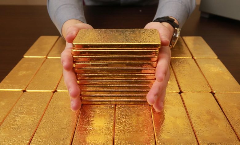 Gold prices poised for monthly gain; focus on US data