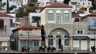 Greek islands, tourists look for 'balance' amid summer crowd