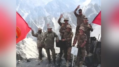 Internal Troops servicemen install flag on Mount Adygine in honor of 100th anniversary of Kyrgyz police