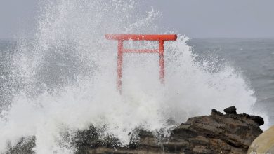 Typhoon Ampil veers away from Japan, allowing trains, some flights to resume