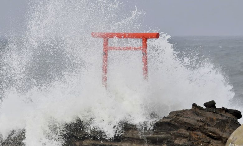 Typhoon Ampil veers away from Japan, allowing trains, some flights to resume