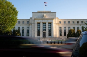 Fed to cut biggest banks’ capital hike by half in overhaul