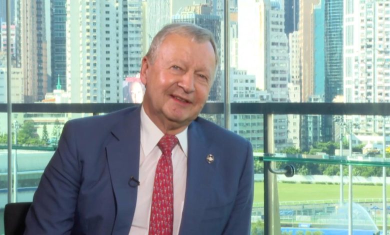 CEO of HK Jockey Club lauds China's enormous, overwhelming development