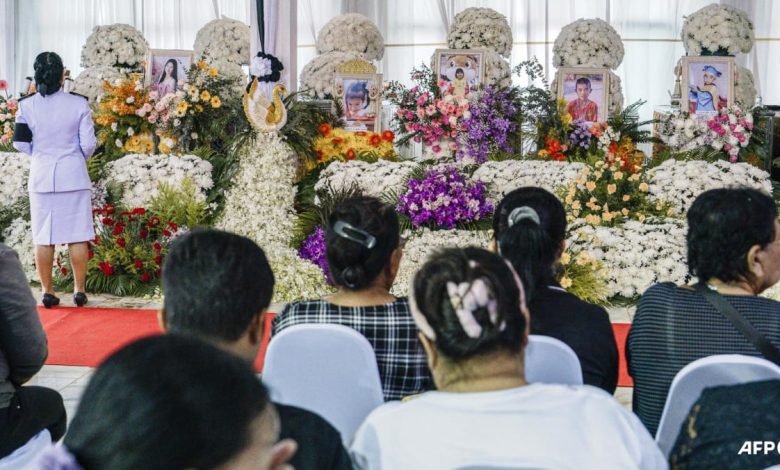 Flowers and toys at funeral for Thai school bus fire victims