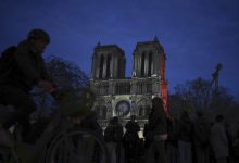 Political storm clouds Macron's Notre Dame glory