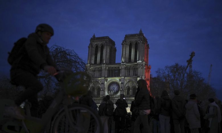 Political storm clouds Macron's Notre Dame glory