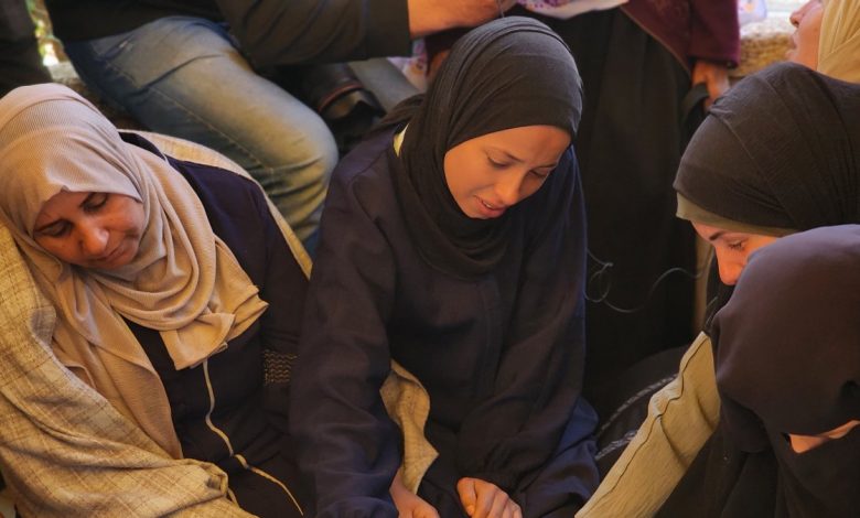 Israel kills 13 more Palestinians, turning Gaza into 'mass grave'