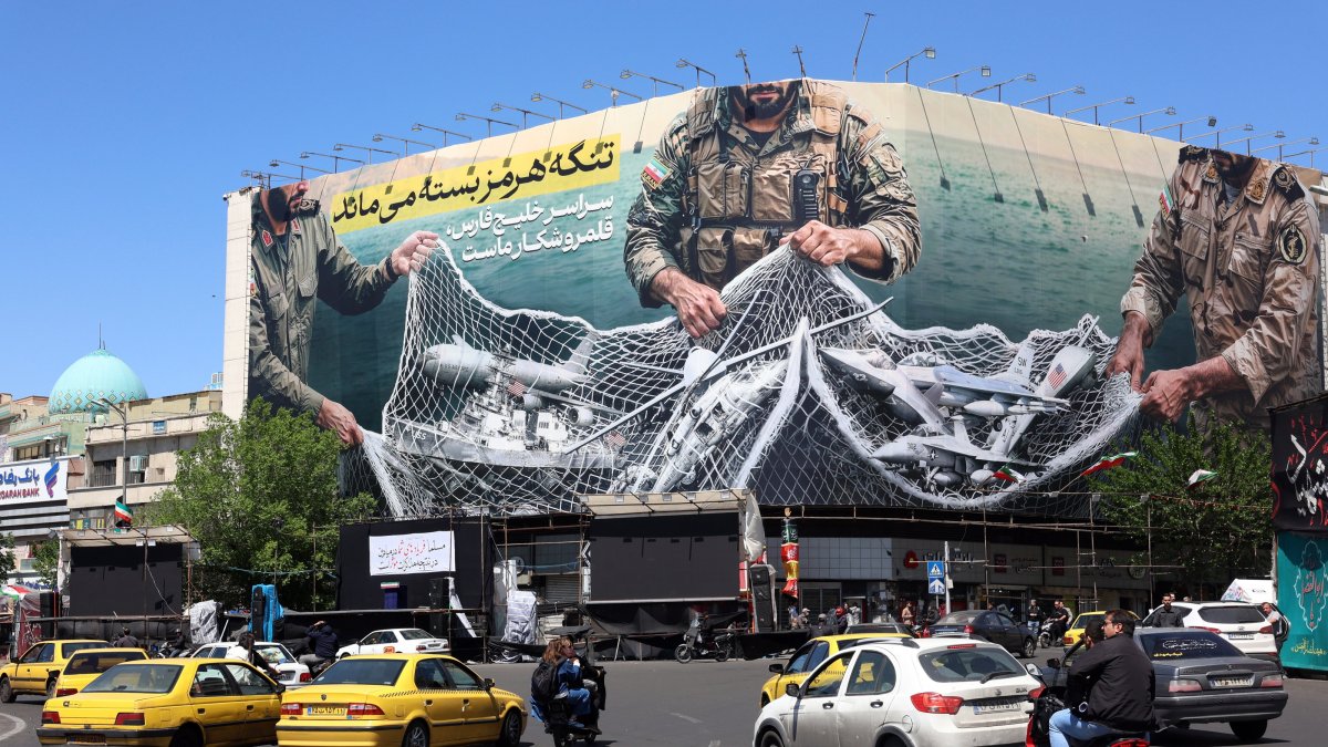 Iran targets 3 ships in Hormuz, rejects reopening it amid US blockade